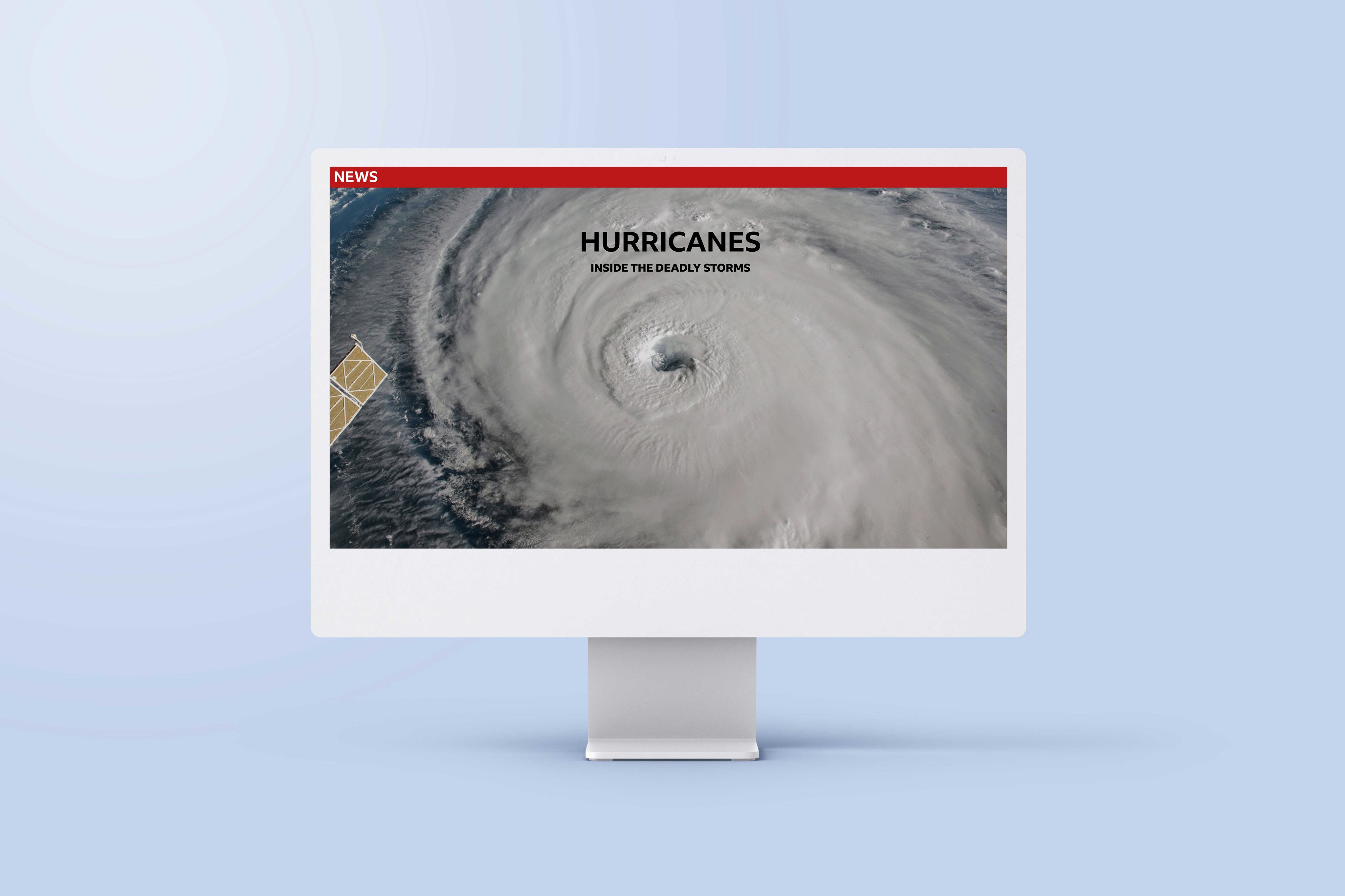 An image of a computer screen sitting on a desk. The screen is showing an example of an interactive map in the article 'Hurricanes: Inside the deadly storms'.