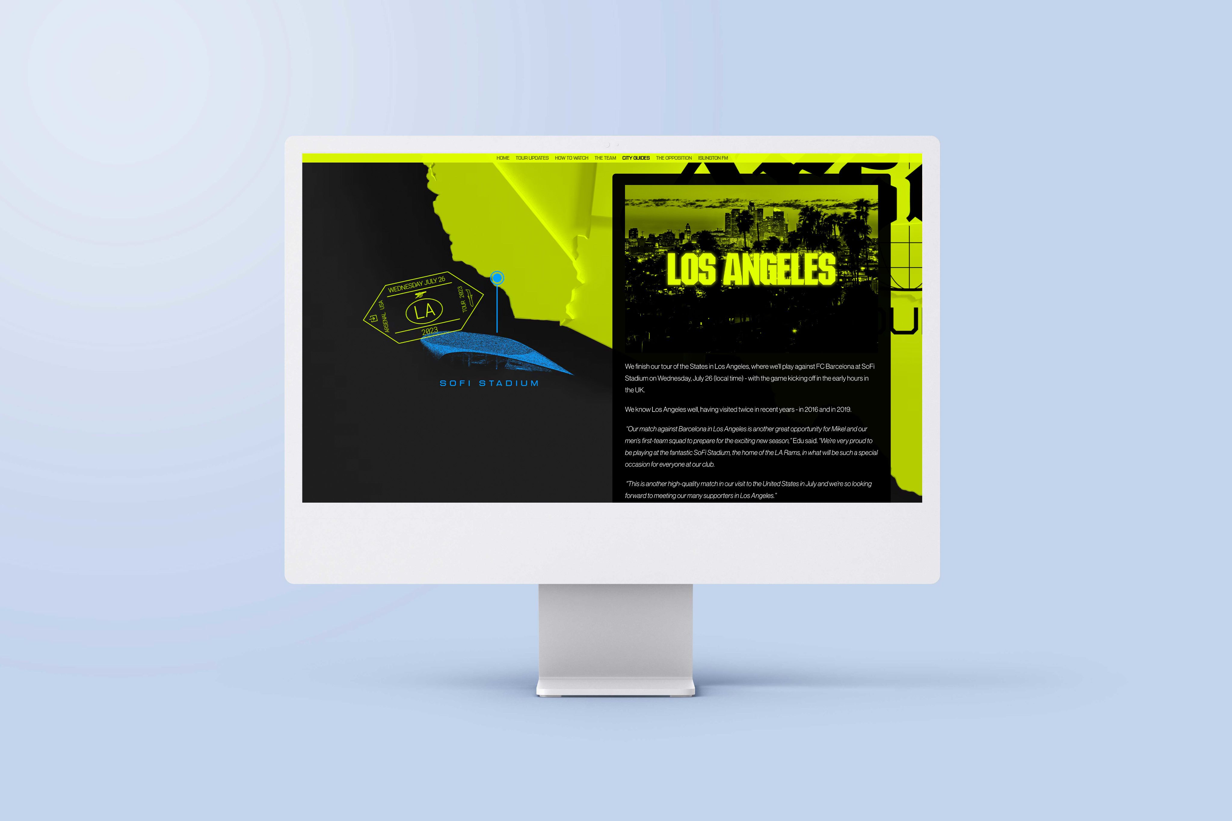 An image of a computer screen sitting on a desk. The screen is showing an example of an interactive map in the article 'USA Tour 2023'.