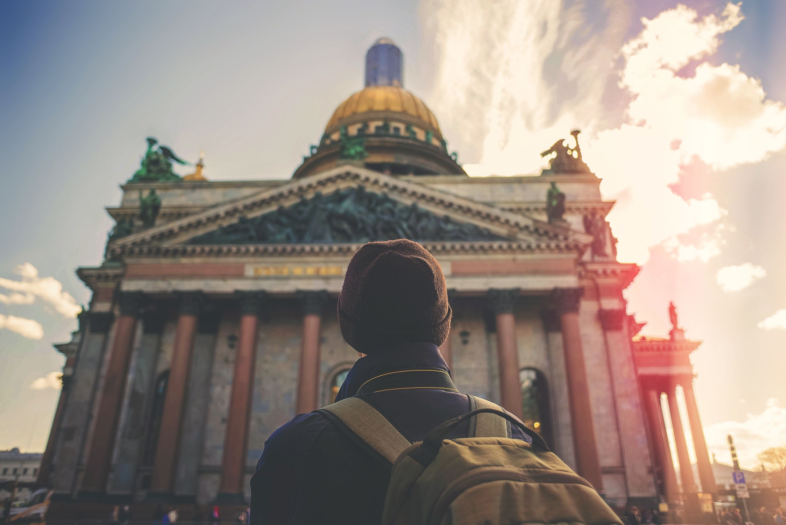 Man facing a historic building