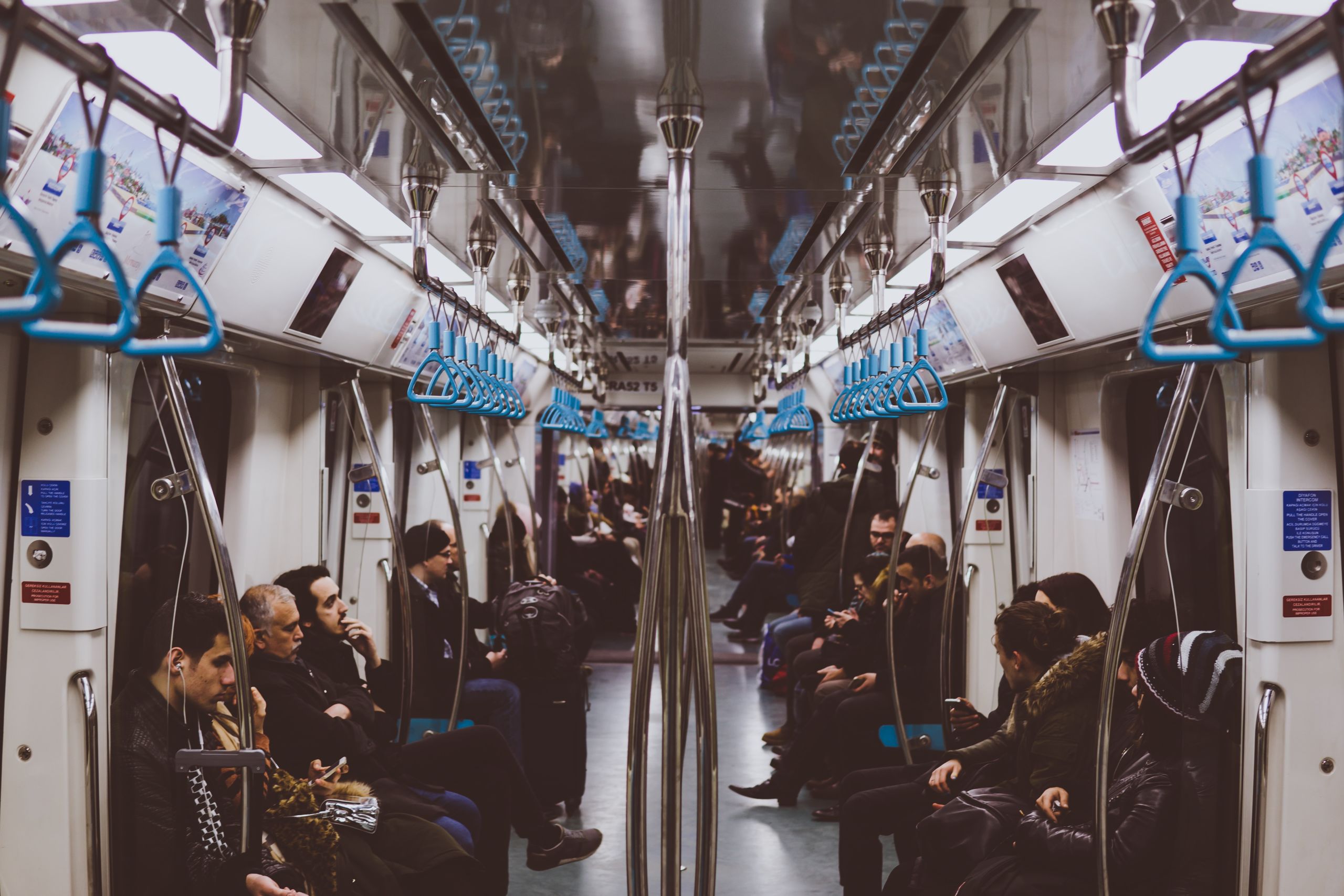 Inside of a crowded subway car