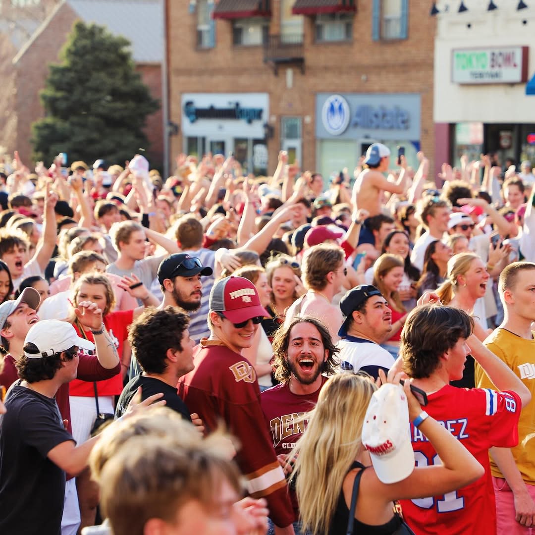 A crowd shot of students on campus celebrating.
