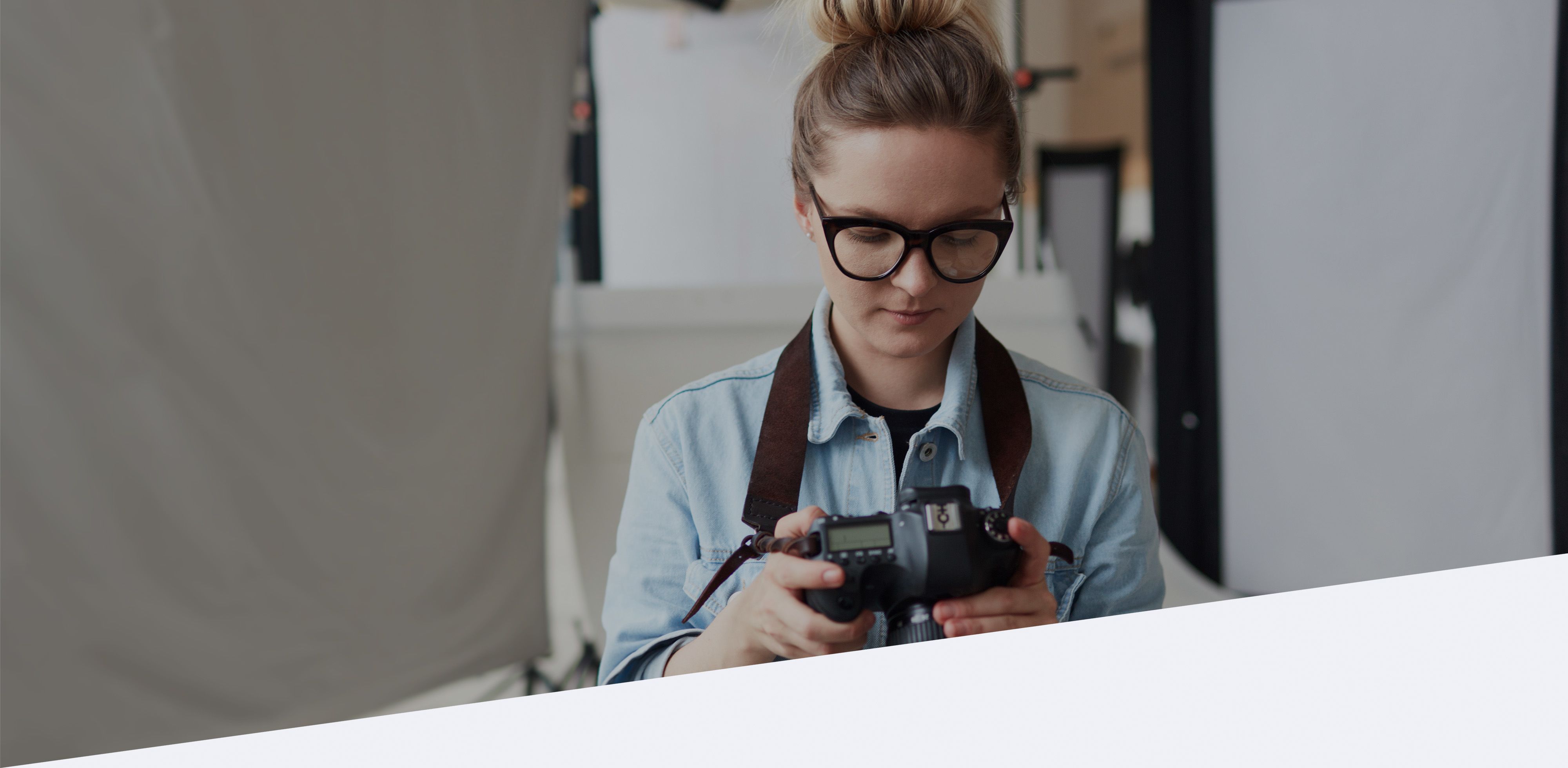 Woman looking into the lens of a camera