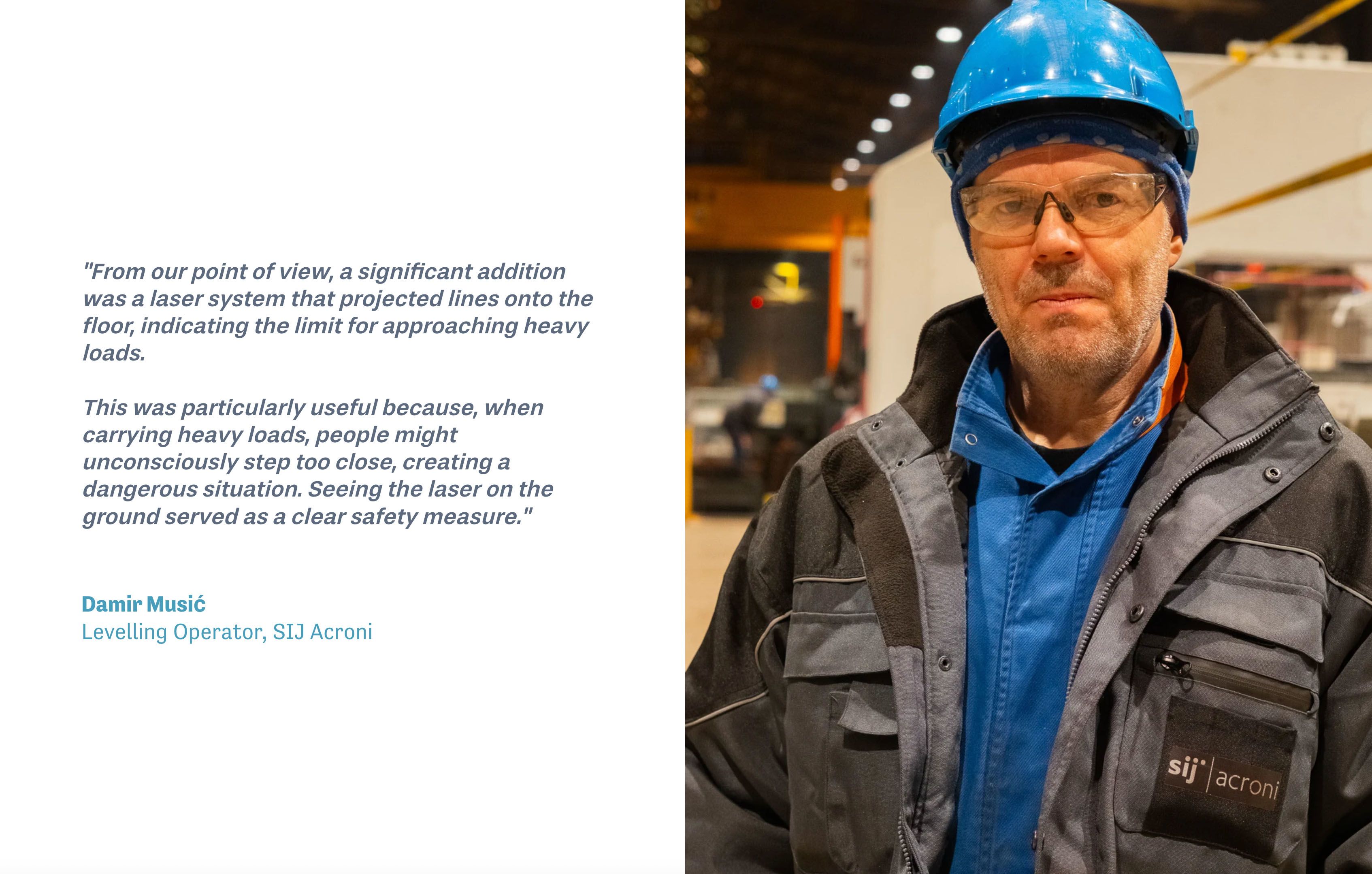 A man with white skin, blue hardhat, safety glasses and a thick grey coat.