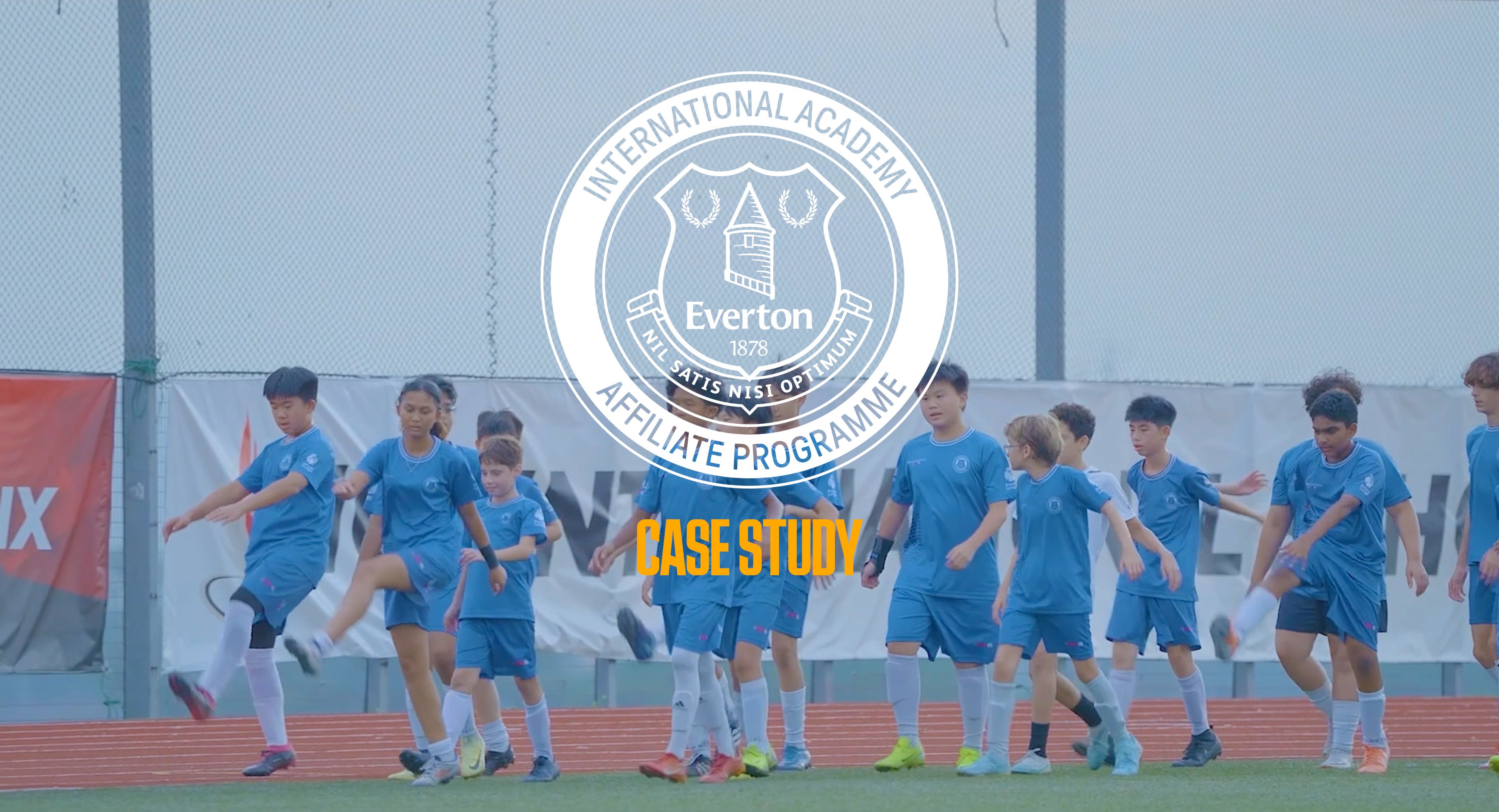 Children in soccer gear stand at training. Text reads CASE STUDY.