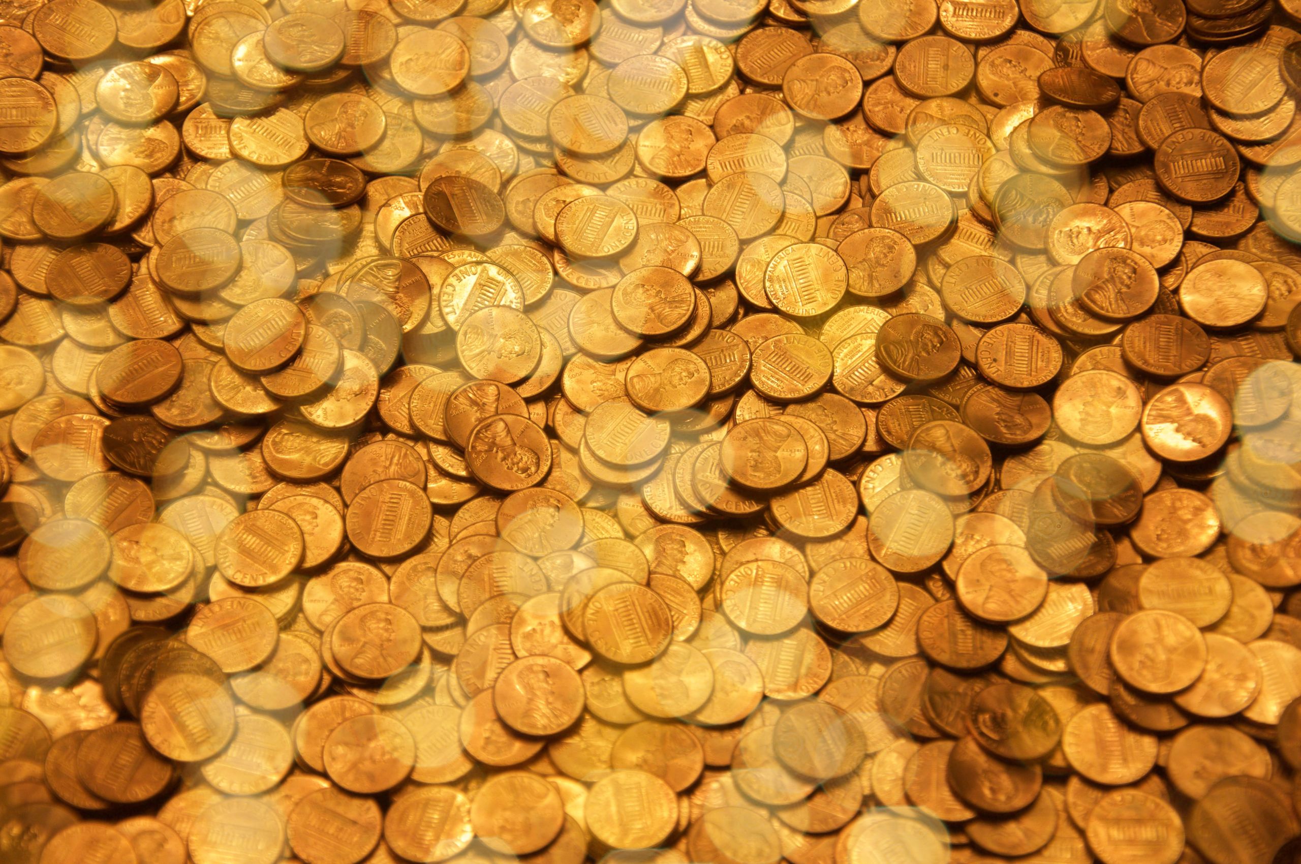 A pile of gold coins, representing the riches one might earn from content monetization