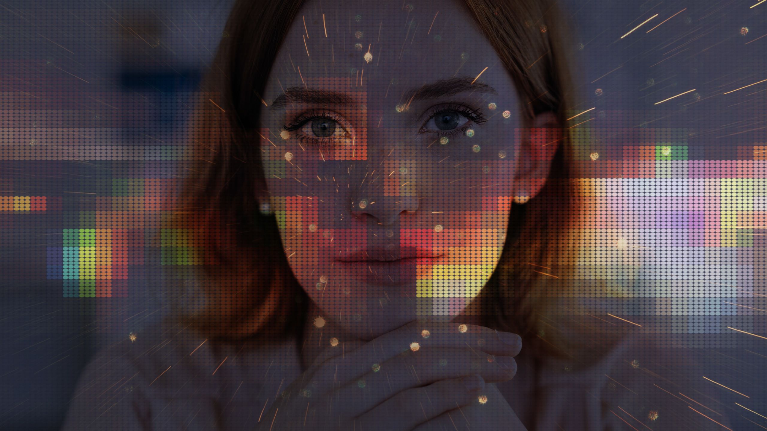 Close up portrait of the face of a young woman immersed with digital screen glitch texture.