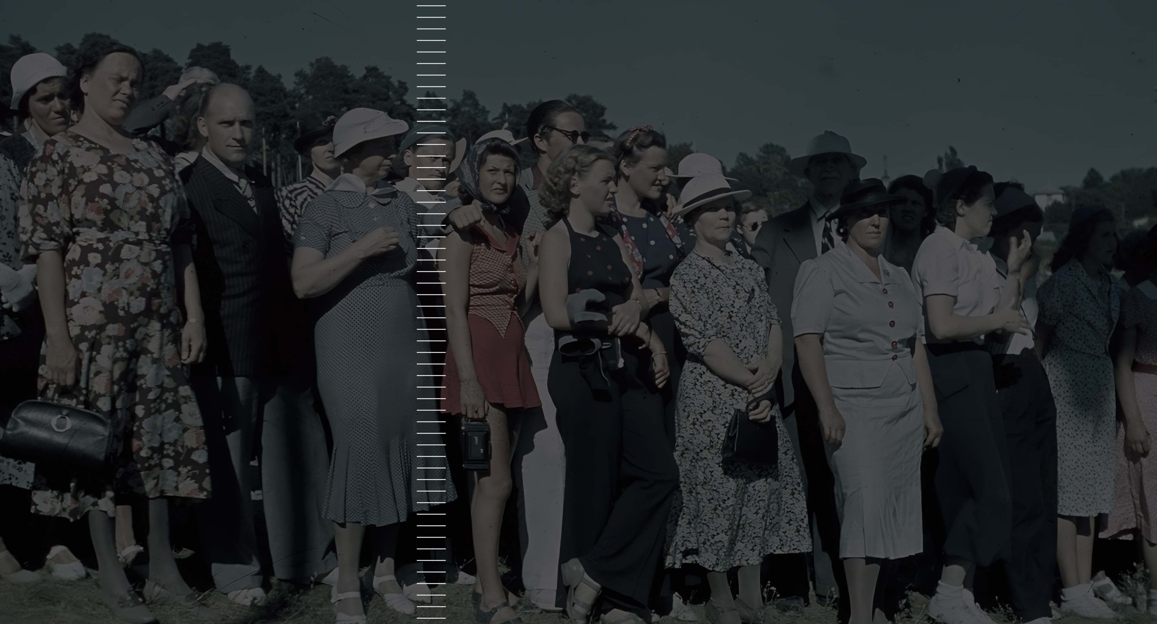 A kodachrome picture of men and women standing in a crowd.