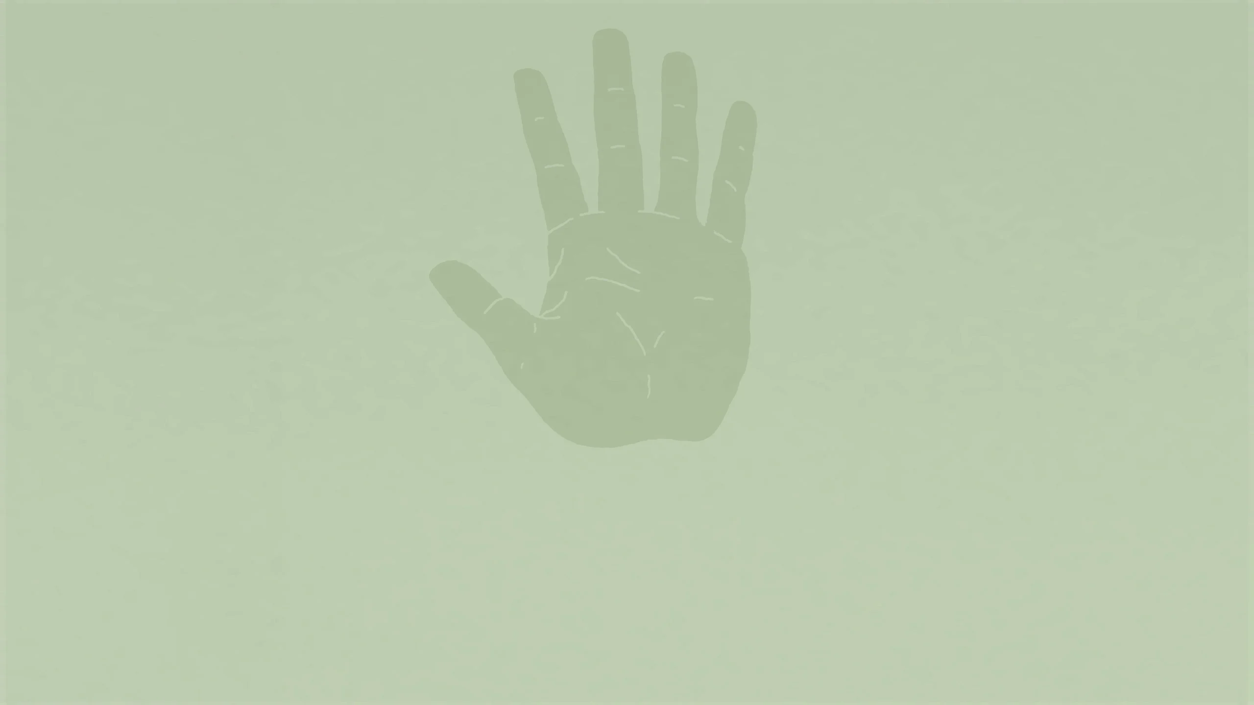 A hand on a green background