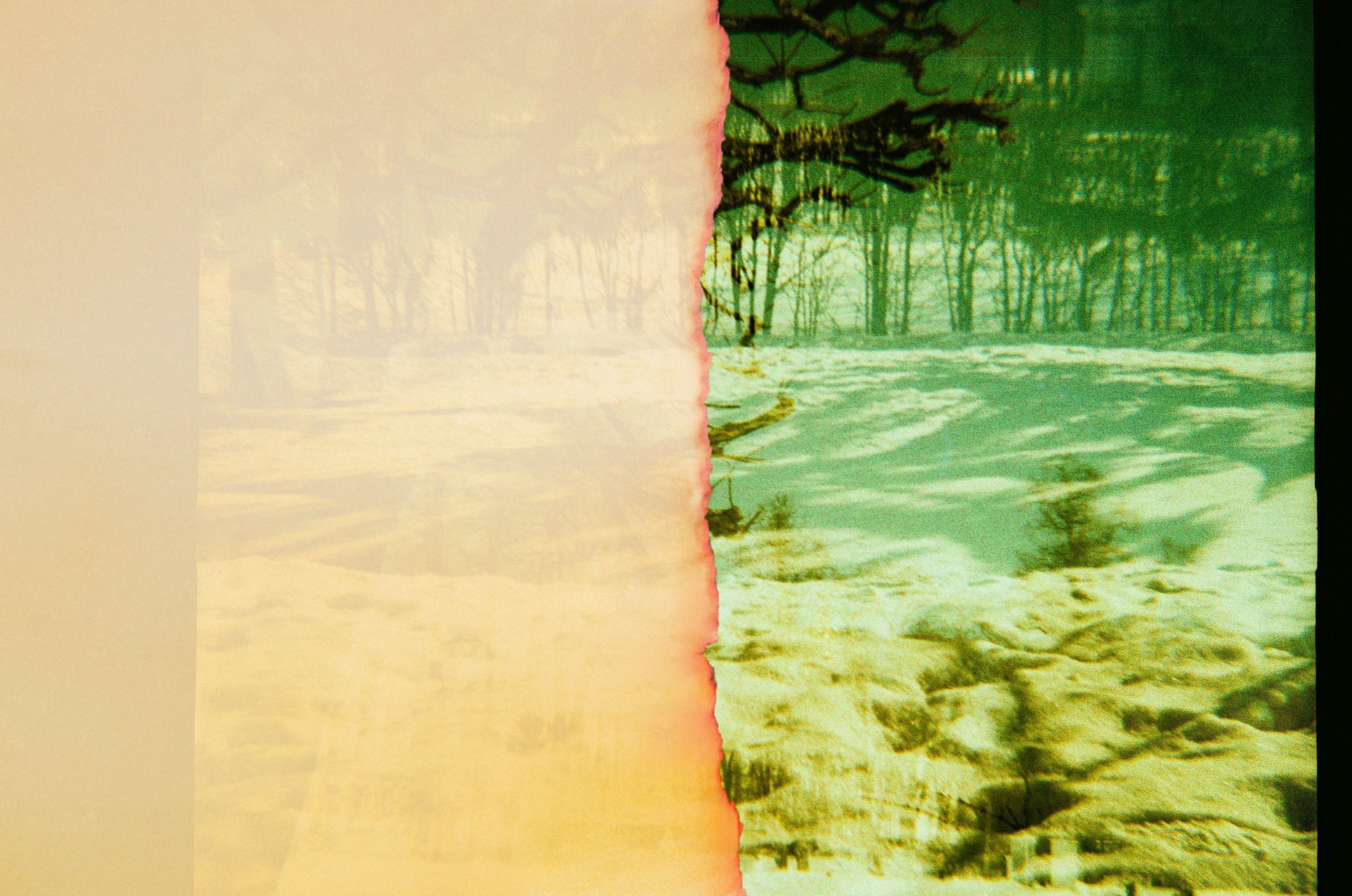 abstract film negative of field covered in snow
