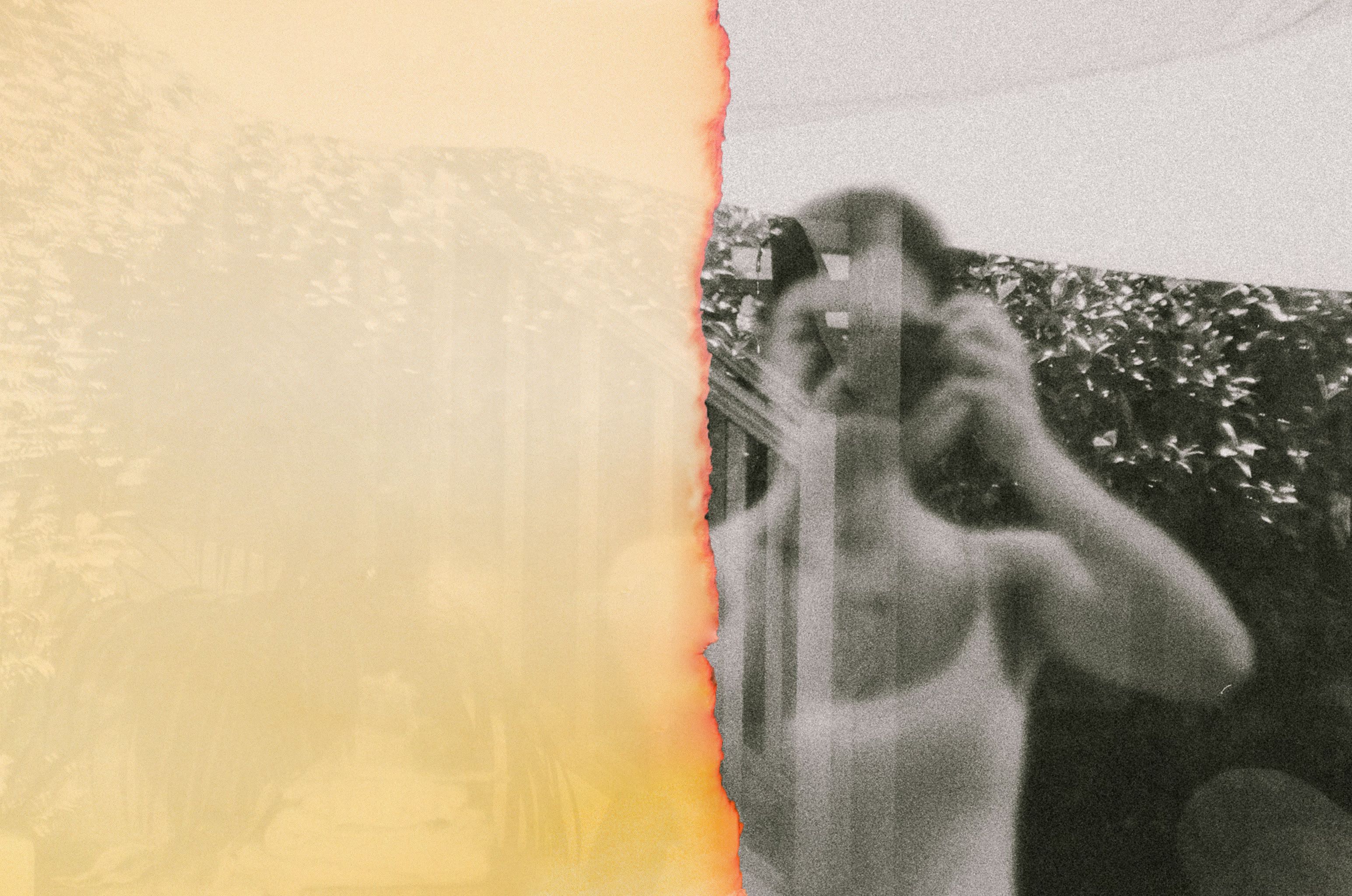 woman taking photo in glass reflection