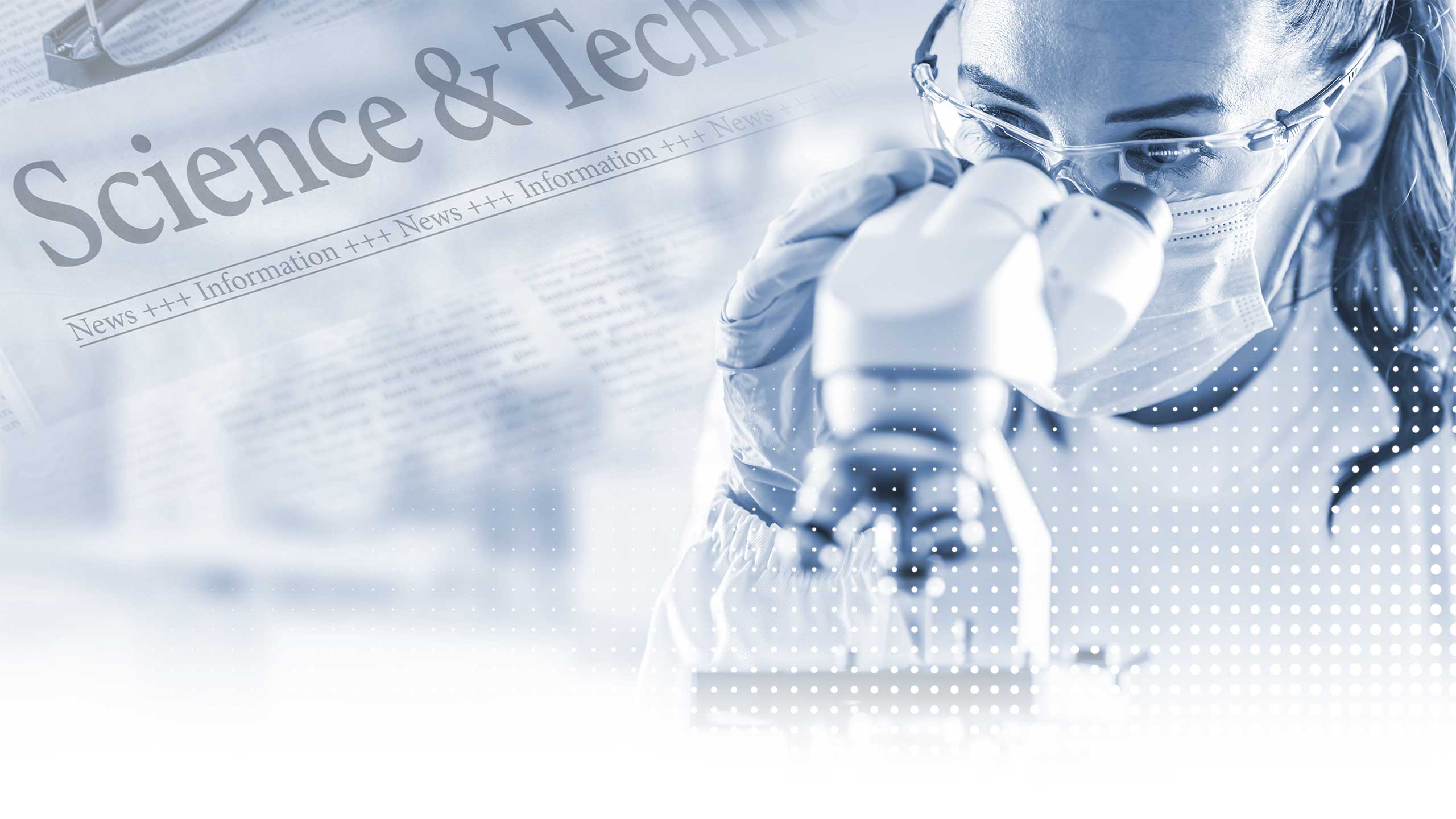 Female lab technician in protective glasses, gloves and face mask sits next to a microscope in laboratory.